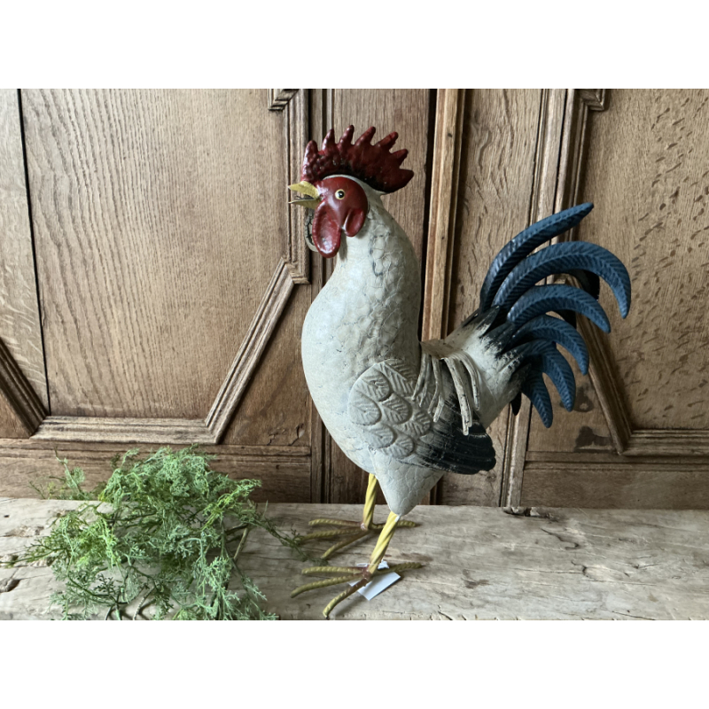 Metalen kip creme met blauw staart