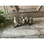 3 goudkleurige vogels op tak